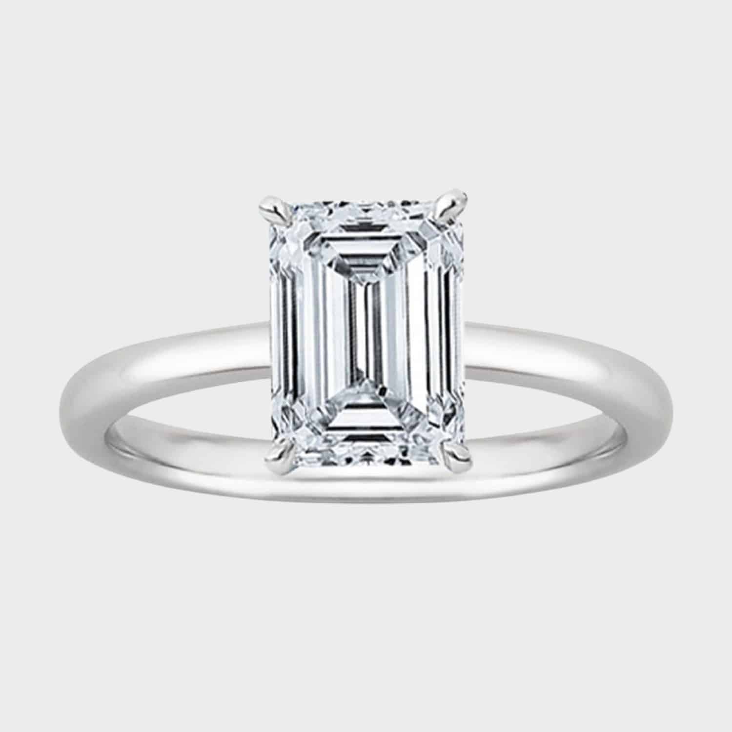 Explore the IGI-certified 1-carat emerald-cut diamond engagement ring in 14K white gold, a stunning option in engagement rings below 1000.