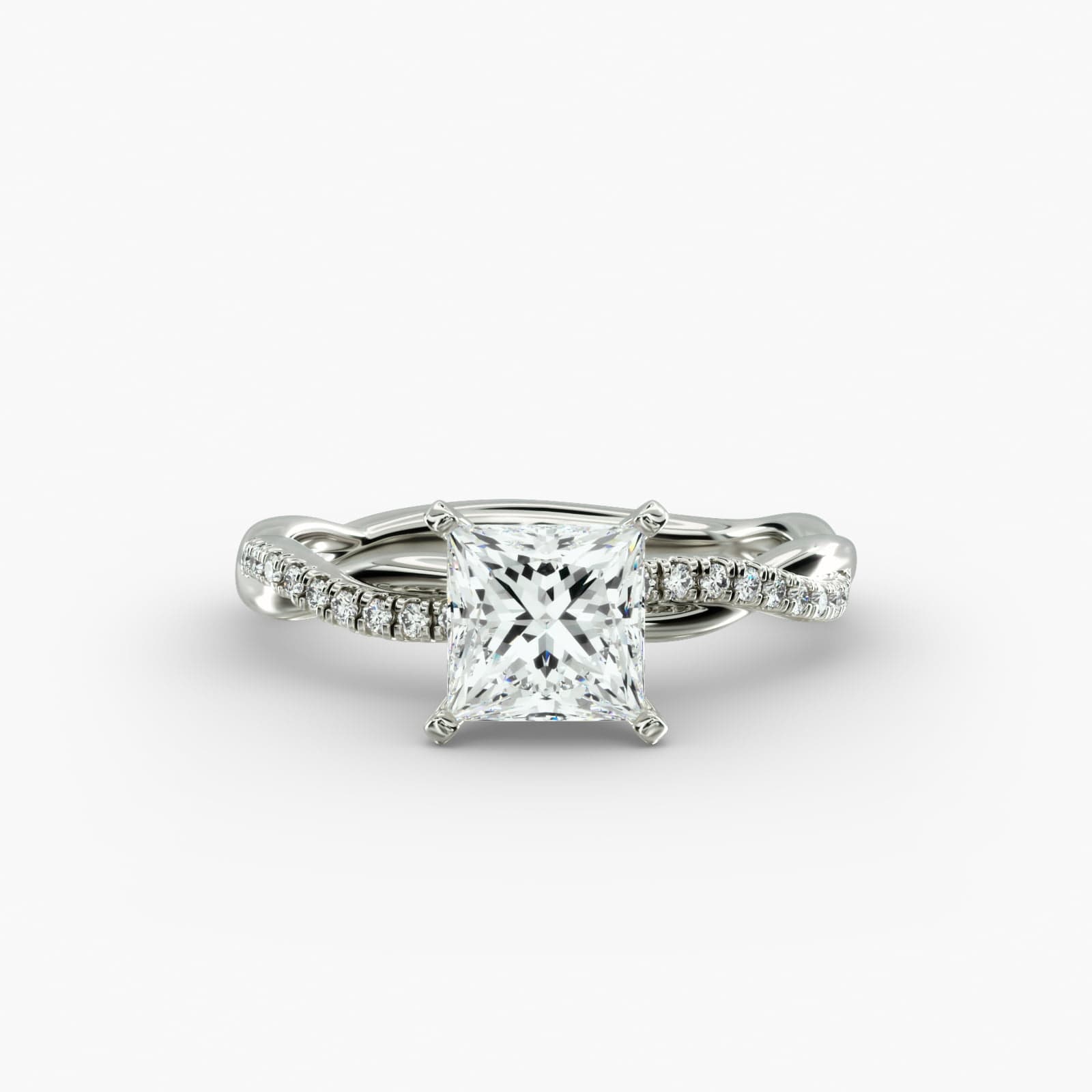 A close-up studio shot of a 2 carat princess cut diamond engagement ring, highlighting the sharp corners of the D-IF diamond and the twisting pavé setting.