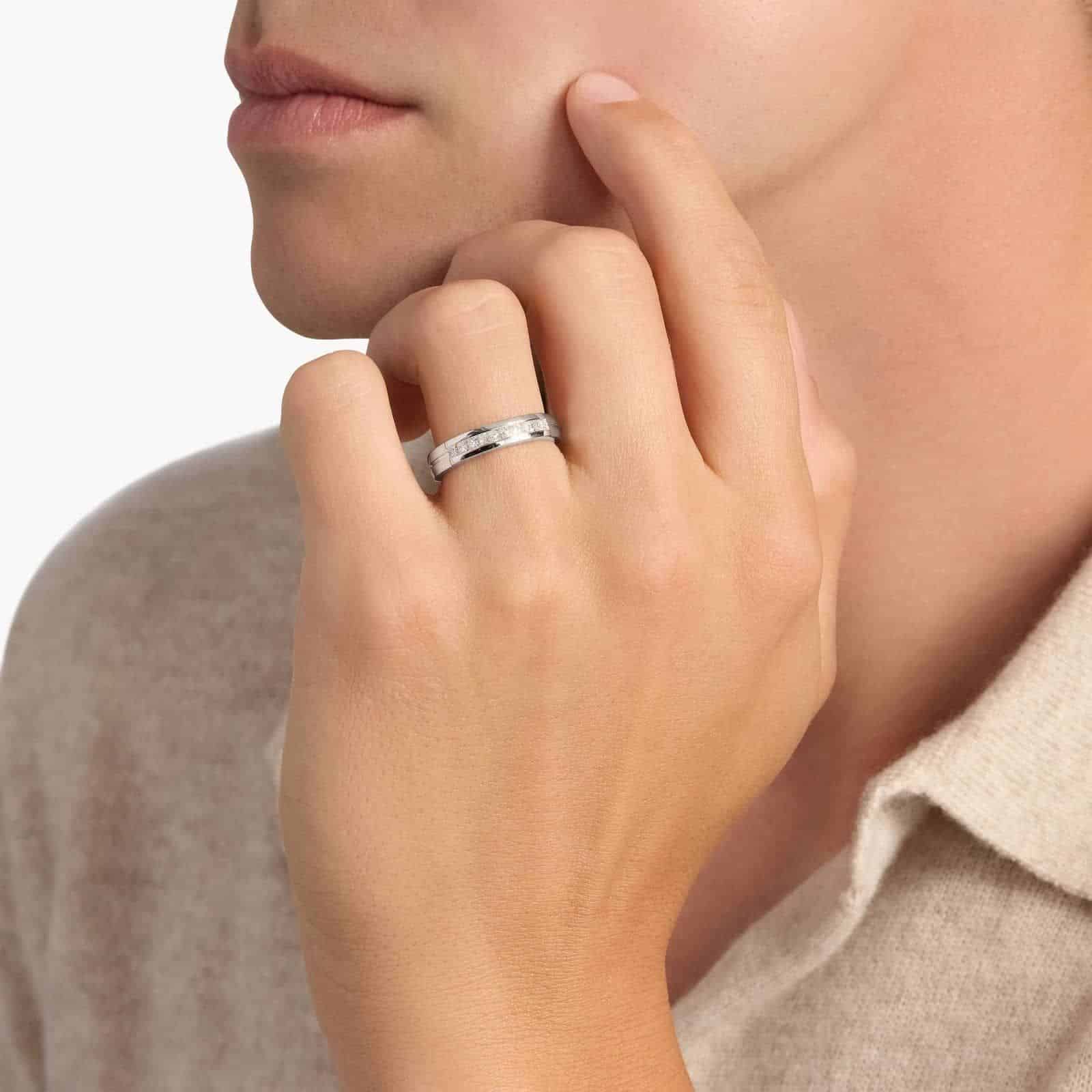 A Channel Set Princess Cut Diamond White Gold Princess Cut Wedding Rings band (4.50mm) in 18K White Gold with 5/8 CTW diamonds.