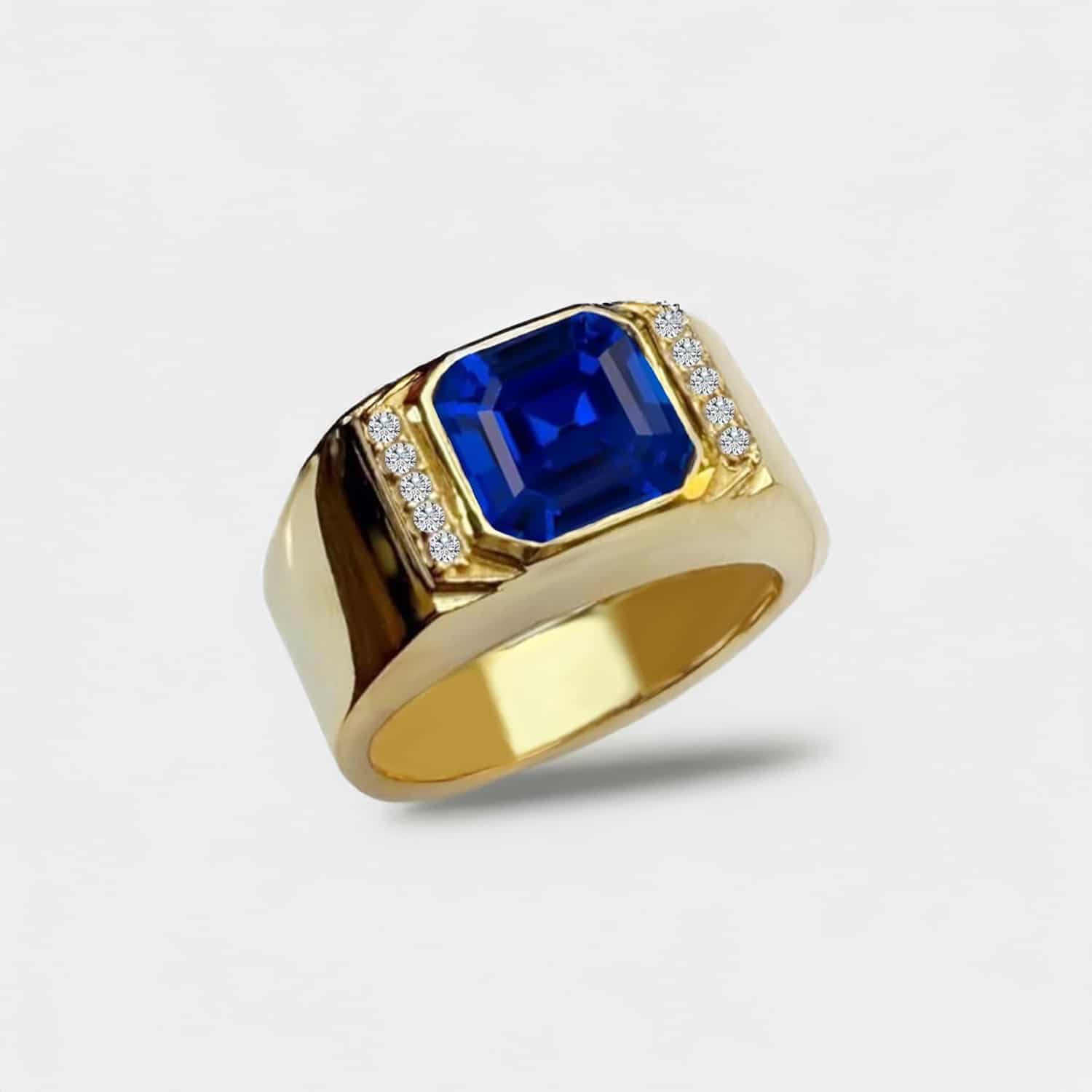 A Yellow Gold Mens Gold Ring With Blue Sapphire featuring a 2 Carat Square Asscher Cut Blue Sapphire set in a secure Bezel Setting, marketed as a men's engagement and wedding ring.