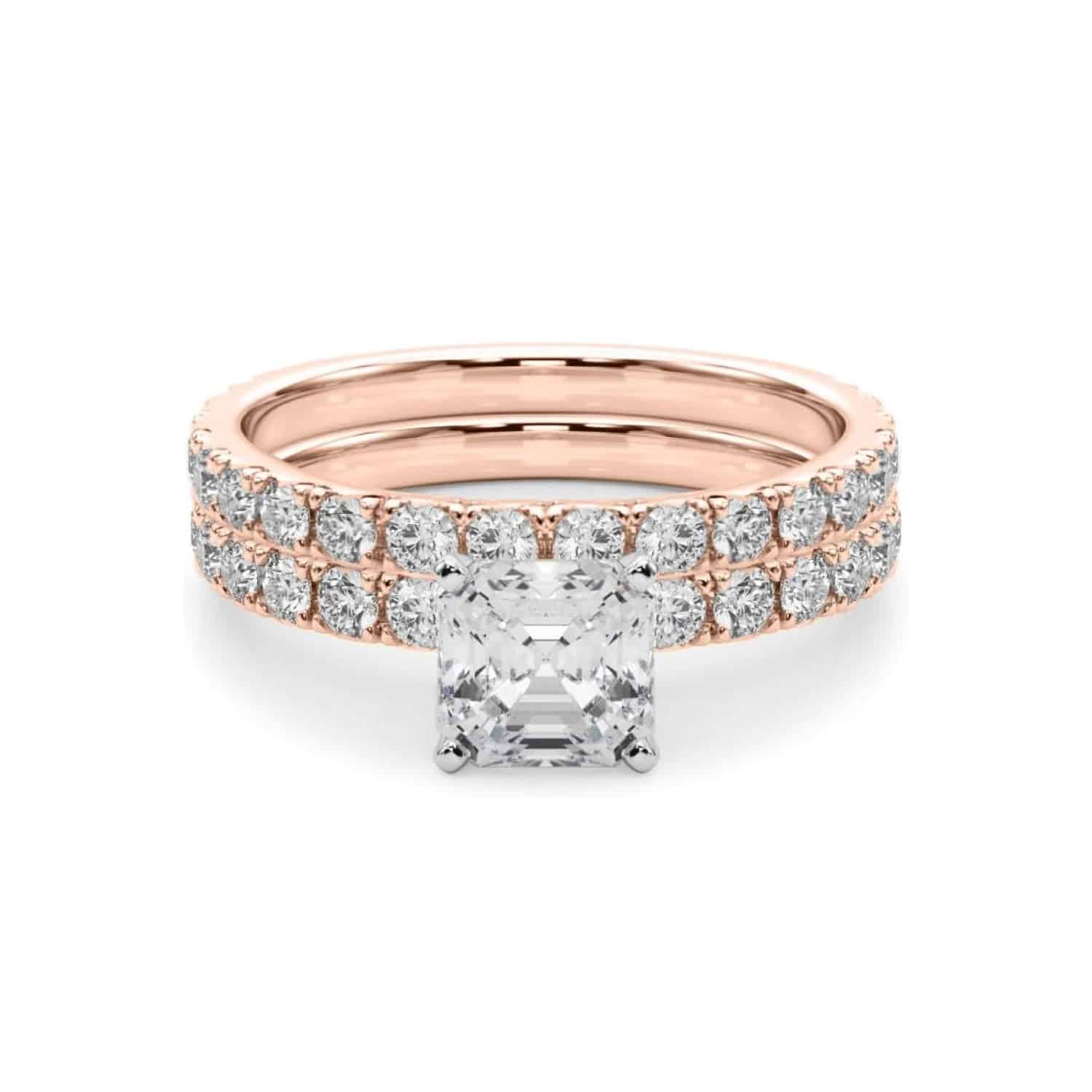 A 14K Rose Gold Cushion Cut Engagement Rings With Wedding Band set, featuring a large Cushion Cut Lab-Grown Diamond solitaire and a 0.5 ct diamond matching wedding band.